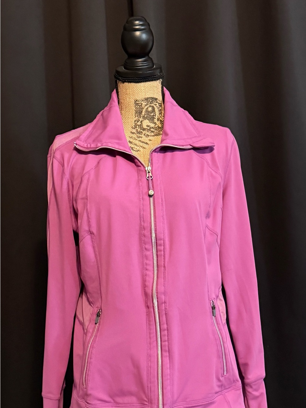 Tangerine athletic zip-up jacket. With 2zipper pockets.